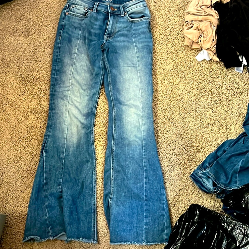 Denim blue flare jeans high-rise.